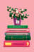 Открытка. Цветок в горшке на книге
